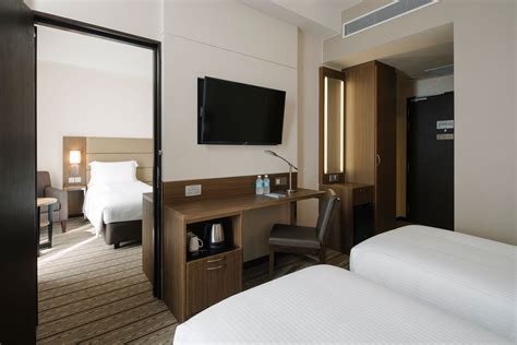 adjacent room in hotel|adjoining room meaning in hotel.